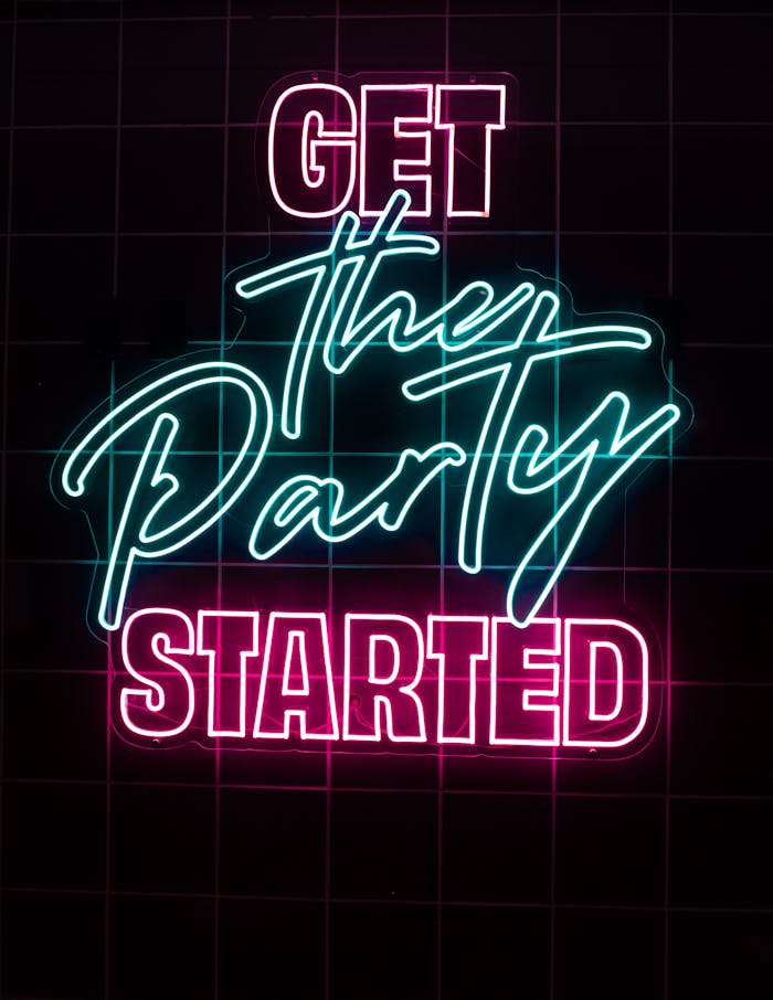 Bright neon sign reading 'Get the Party Started', perfect for event promotions.